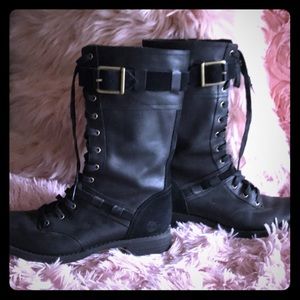 Black lace up and zipper up Timberland Boots
